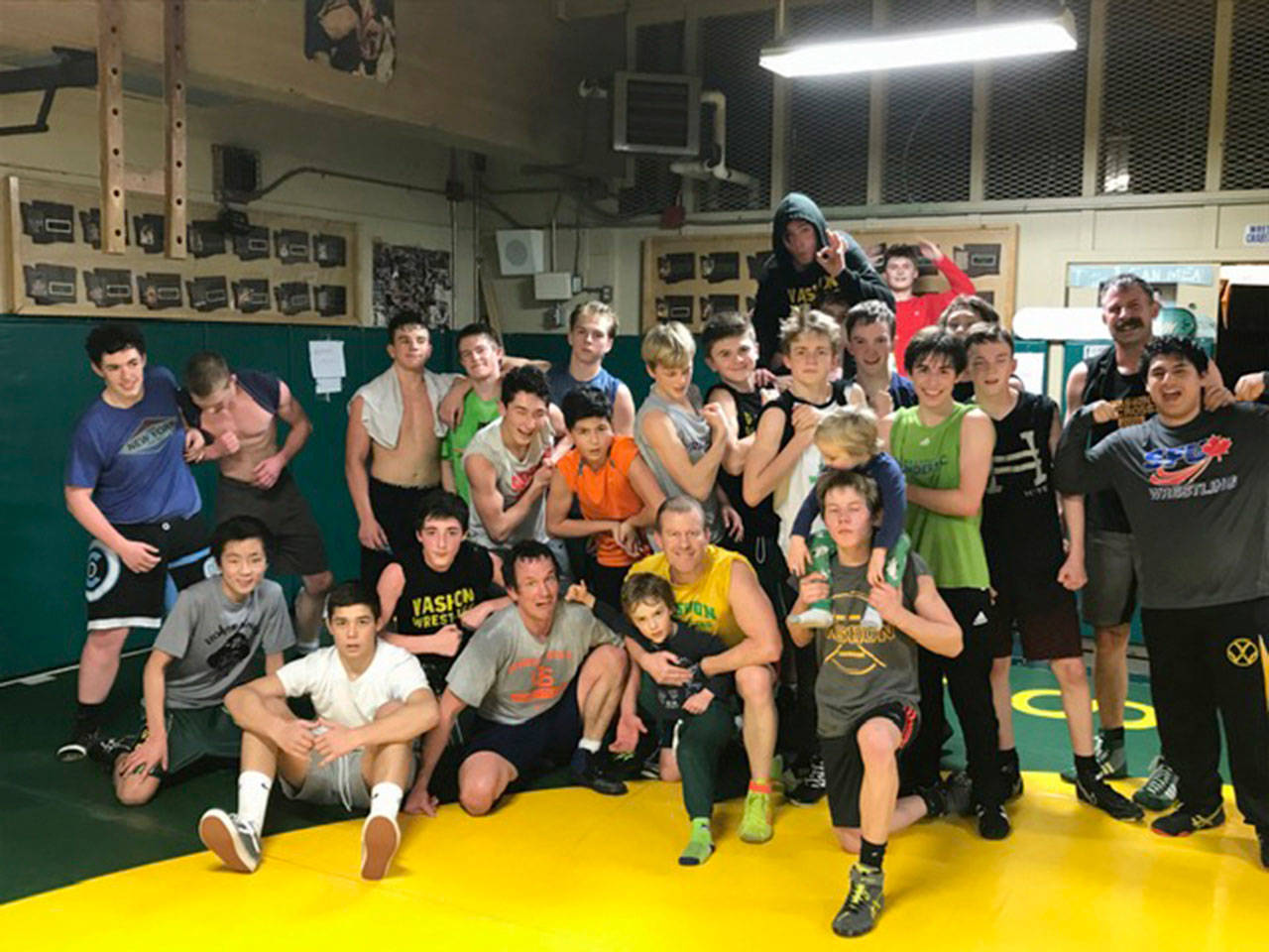 Courtesy photo                                Vashon wrestlers, coaches, celebrate win over Klahowya last Thursday.