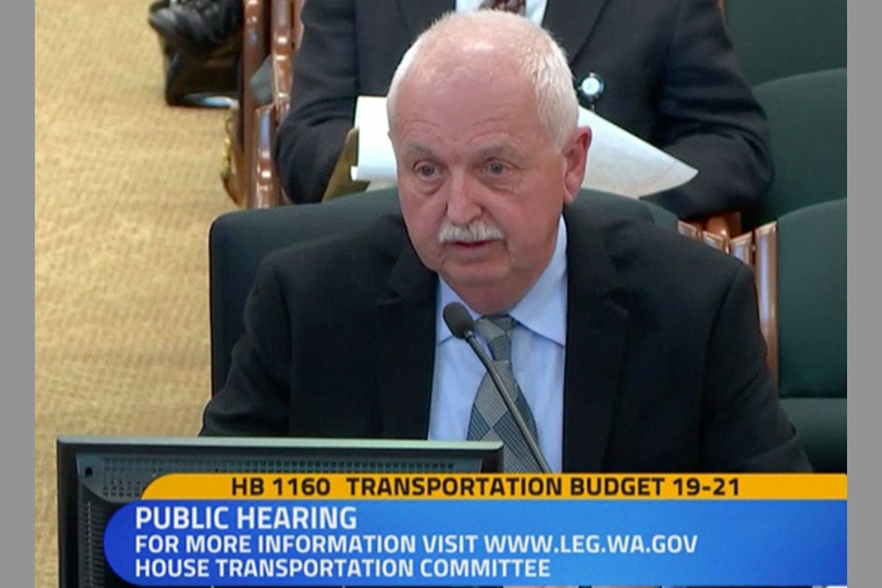 Steve Stockett speaks to the House Transportation Committee on Jan. 31. (Photo from TVW footage)