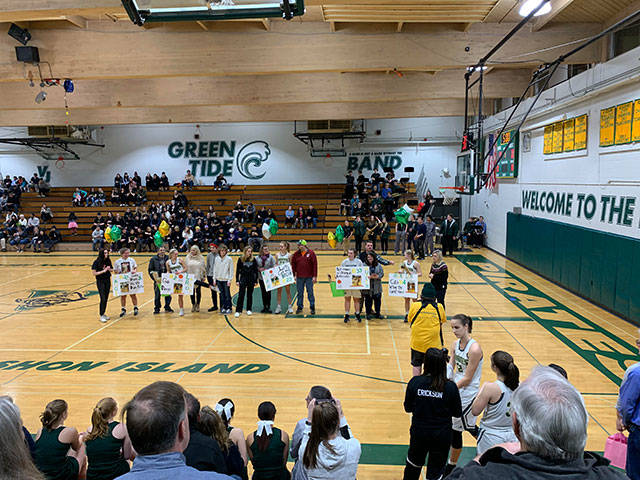 The girls basketball team honors its seniors at their last home game, Feb. 6 (Chris Koebelin Photo).