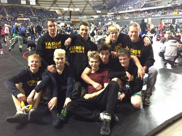 Vashon wrestlers placed 21st out of 47 teams overall at the Tacoma Dome last weekend. Former Vashon wrestler Adrian St. Germain, second from left, joined the group for the picture (Courtesy Photo).