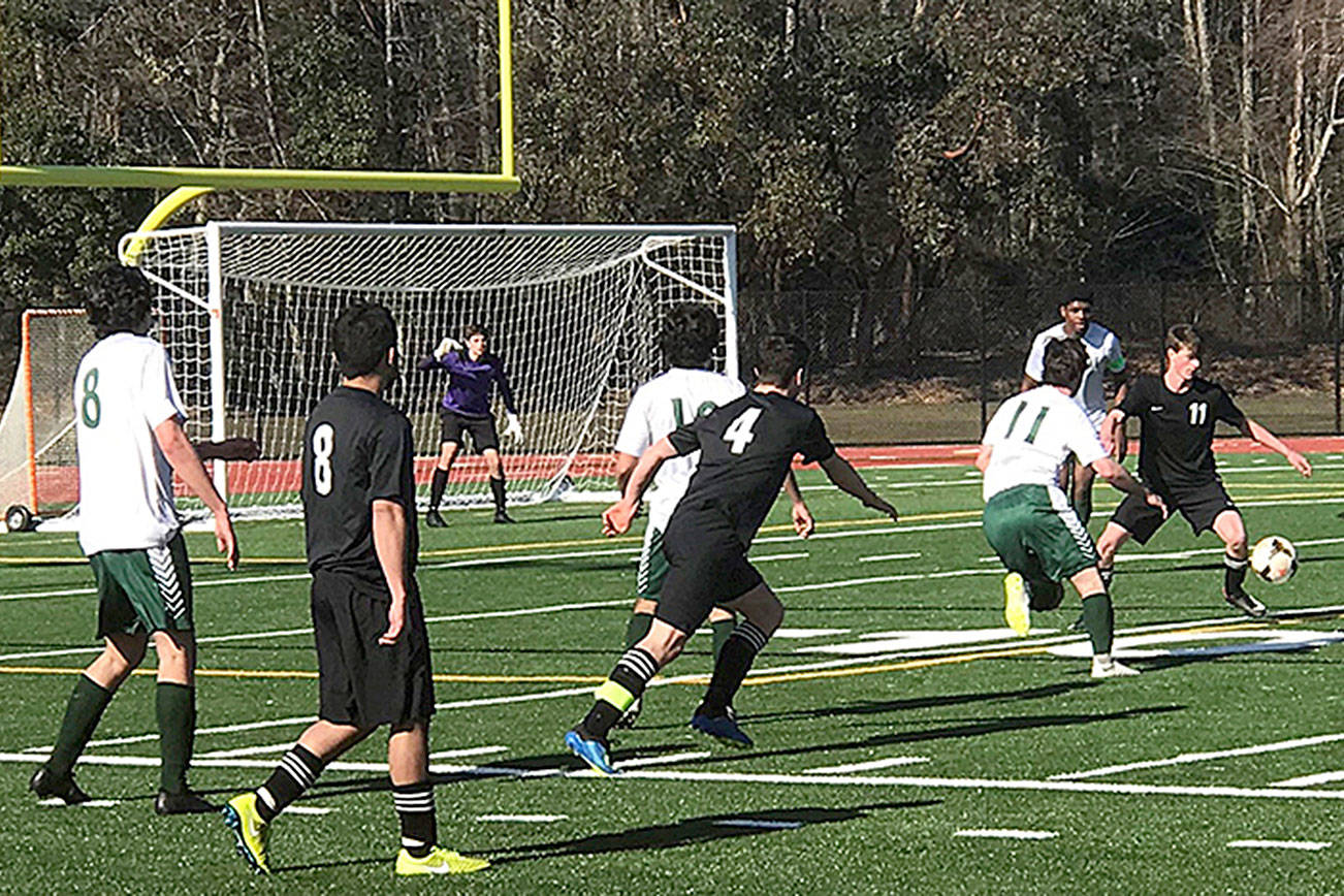 Soccer team open season with tie game against state champs