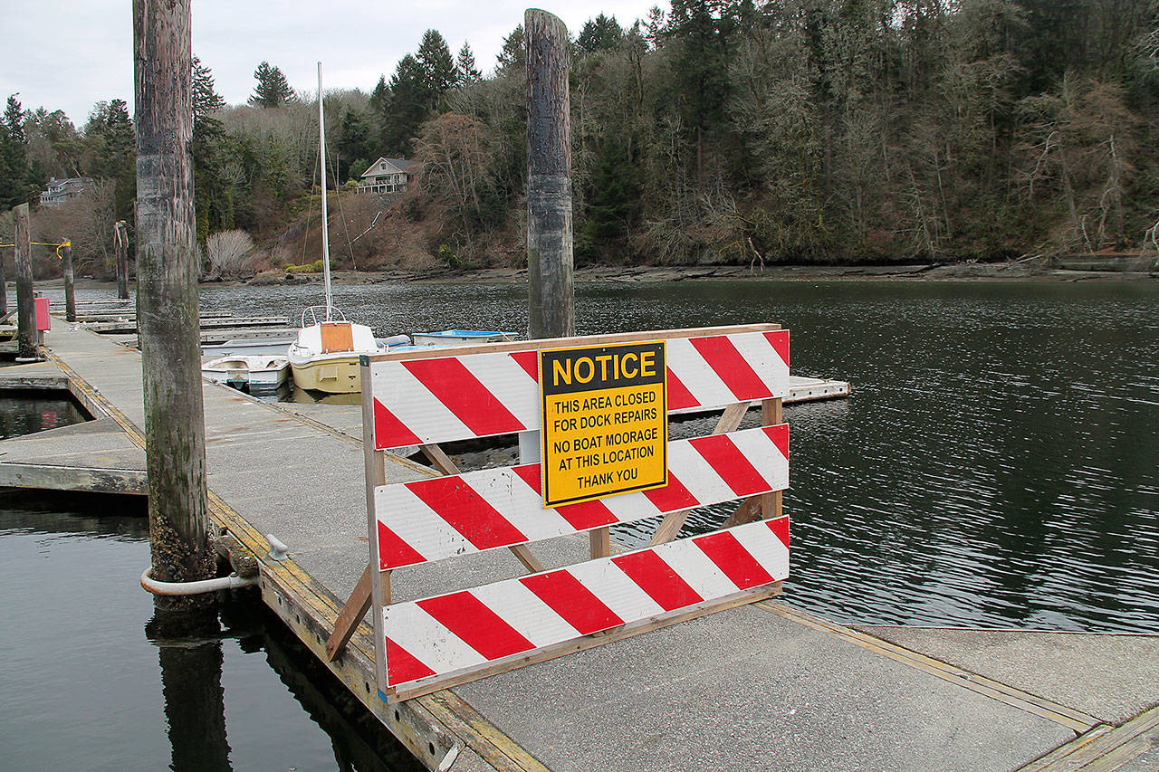 Barricades are blocking access to much of the pier at Dockton Park. Because of structural damage, only the main portion of the dock is open. (Susan Riemer/Staff Photo)