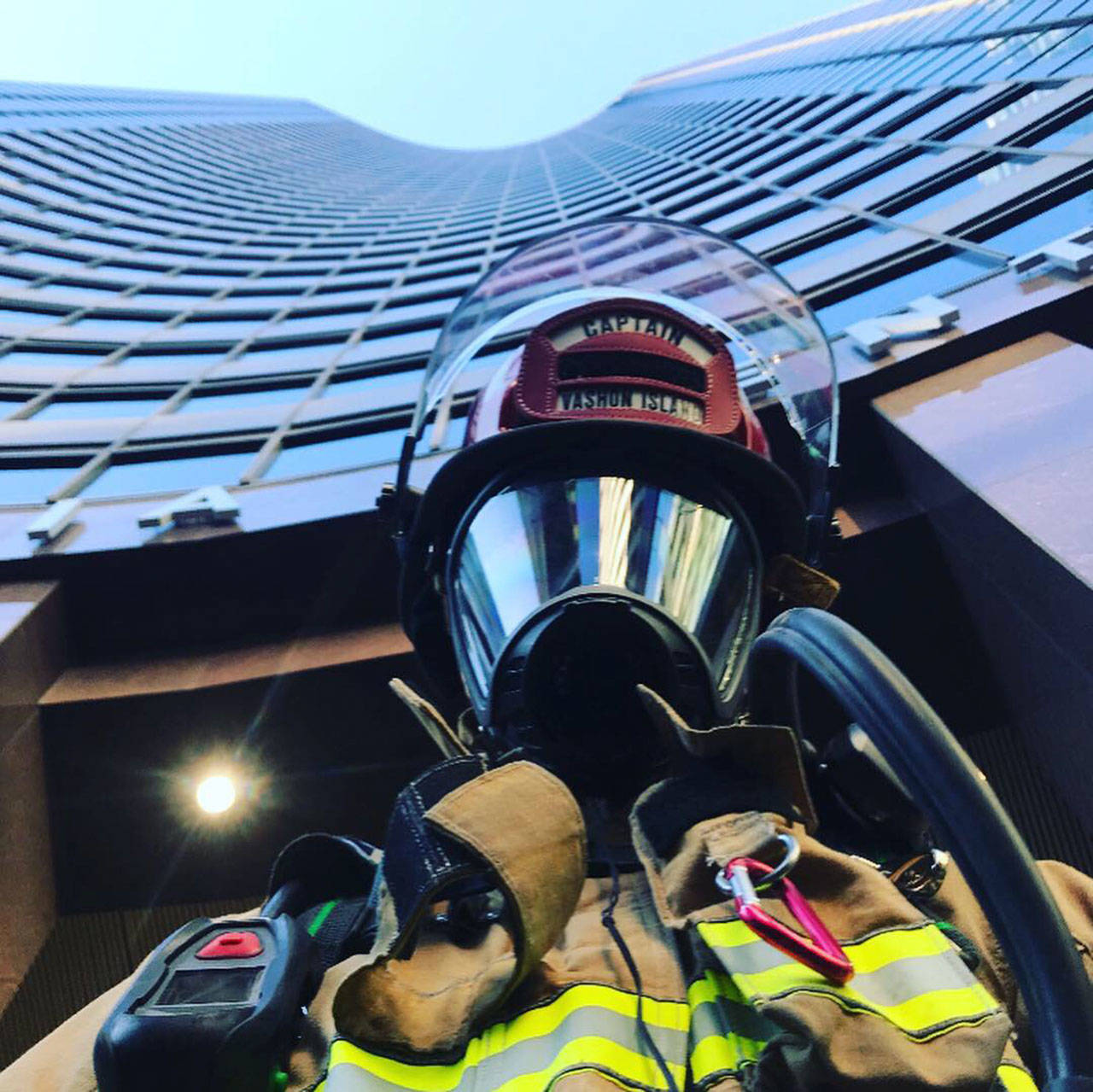 The Columbia Center looms above Captain Josh Munger at the Firefighter Stairclimb earlier this month.