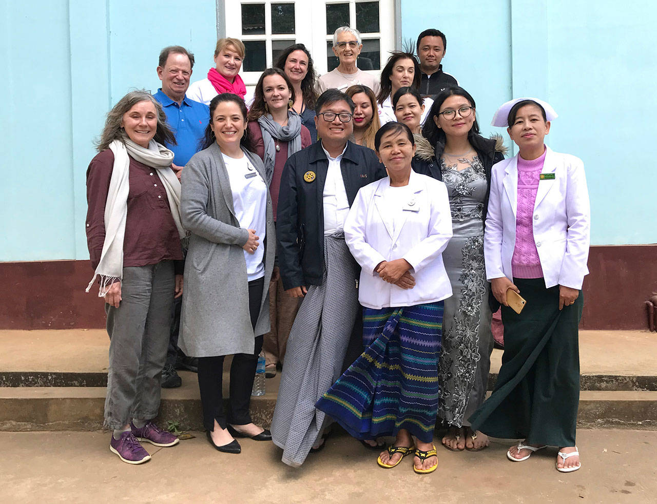 Colin Hennessey, Lin Holley, Eliza Steele and Heather Russell are the four islanders who went on the trip. They are pictured above, outside the hospital in Pindaya, Myanmar, along with others working on the project. (Courtesy Photo)