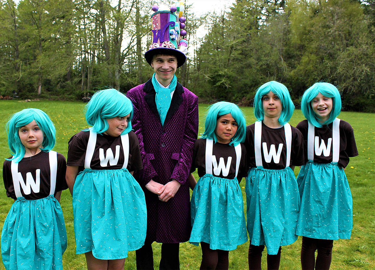 Courtesy Photo                                Oompa Loompas Lena Baldwin-Snell, Sophie Dempster-Guillino, Utisah Durahim, Sonya Guadagno, and Shelby Schonbok join Gabriel Dawson, cast as Willy Wonka, in Vashon Center for the Arts’ upcoming production of “Willy Wonka, Jr.” Durahim and Cooper Tantau (not pictured) are double-cast as Charlie Bucket.