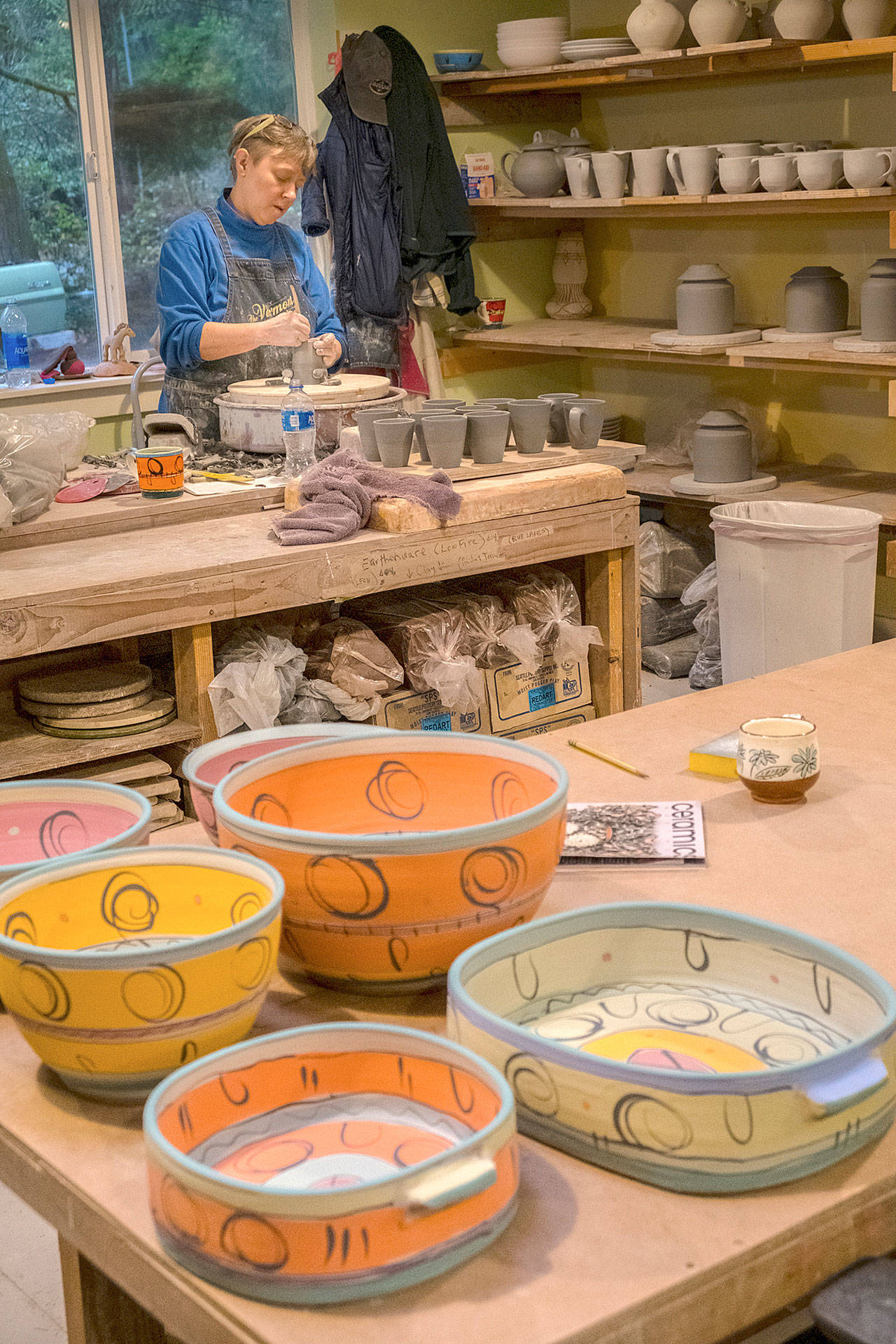 Liz Lewis, one of the founders of Vashon’s semi-annual art studio tour, will once again show her colorful bowls, pots, and dishes in the upcoming tour (Terry Donnelly Photo).