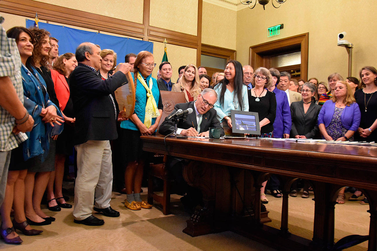 Governor signs bills to aid orcas, bolster salmon