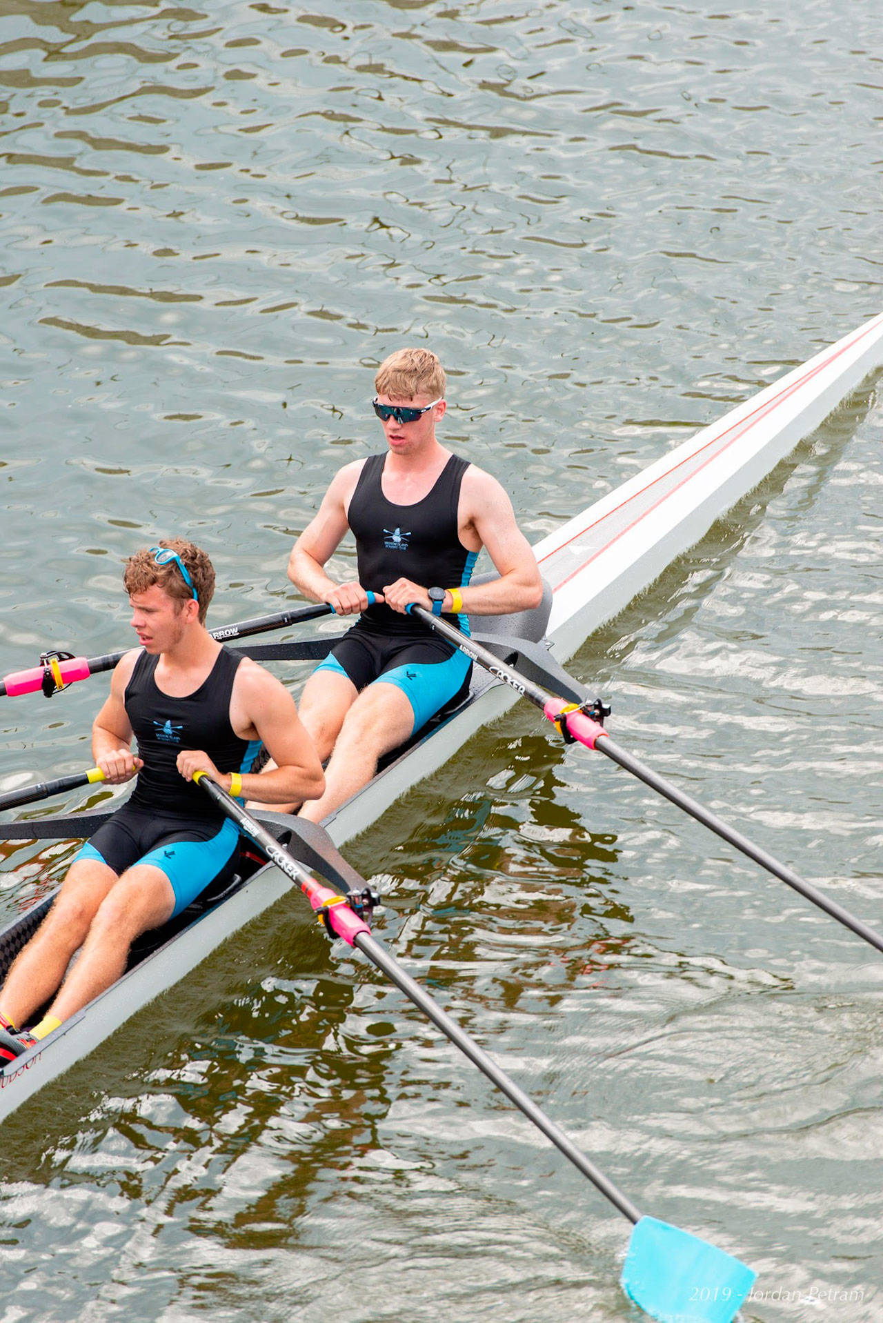 Tor Ormseth and Rohin Petram sit in their double before racing to a personal best time of 6:55 in the repechage at the Youth National Championships in Sarasota, Florida. (Jordan Petram Photo)
