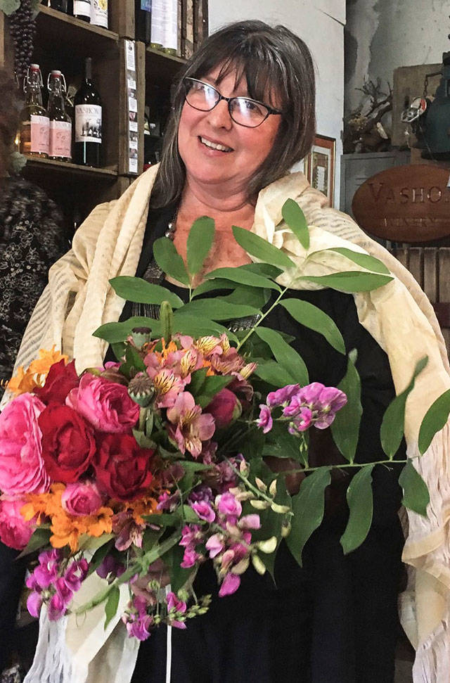 Susan Lynch was named Vashon’s new Poet Laureate in a ceremony held on June 7 at the Vashon Winery (Michael Elenko Photo).