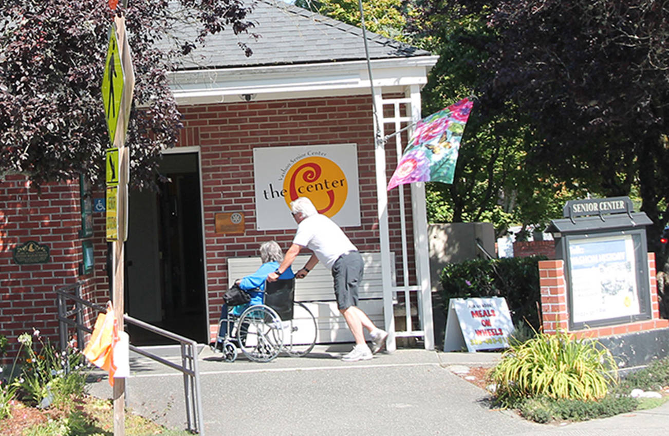 Islanders arrive for lunch at the Senior Center, which serves the meal four days a week. (Susan Riemer/Staff Photo)