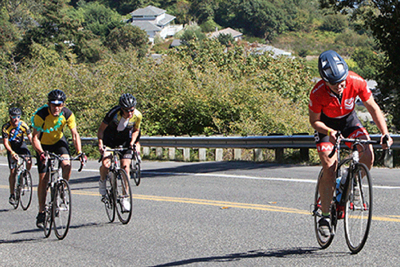 Riders make their way up the steep Gold Beach hill in a previous Passport to Pain. (Courtesy Photo)