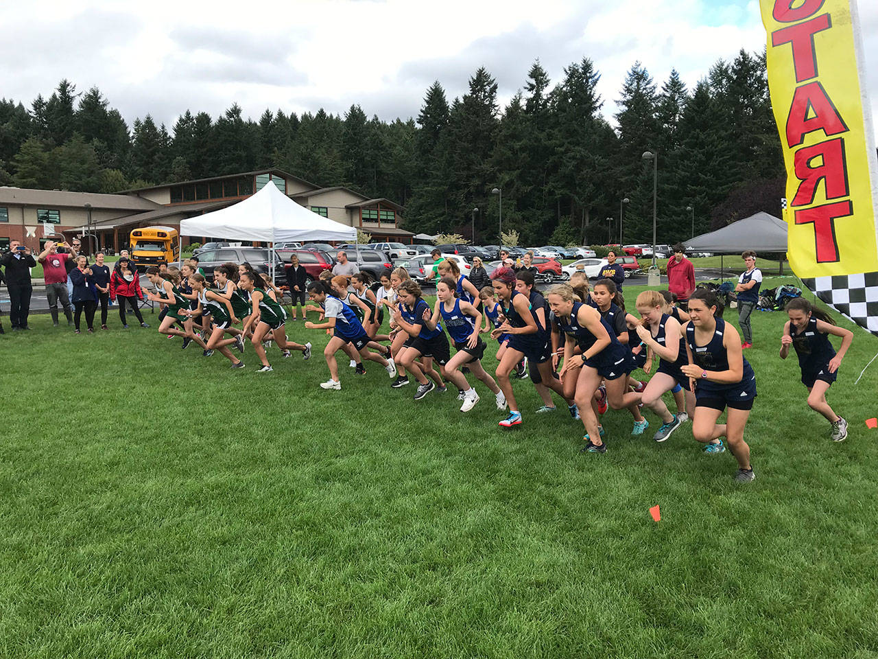 The girls leave the start line in the Sept. 17 meet at Charles Wright (Bruce Cyra Photo).