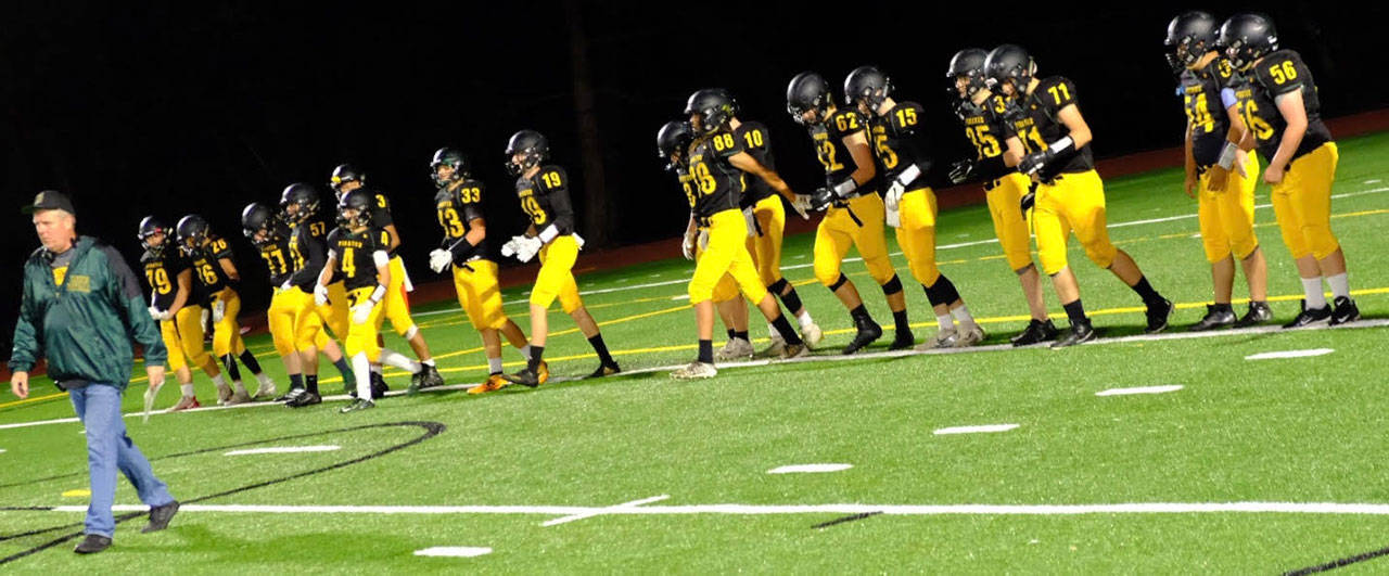 The Vashon Island High School Pirates face off against the Port Townsend High School Rednecks on Friday, Oct. 4, at VHS during the homecoming game (Robert Troup Photo).