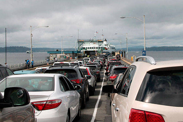 The Fauntleroy dock is packed with cars in this photo from August of 2016 (File Photo).