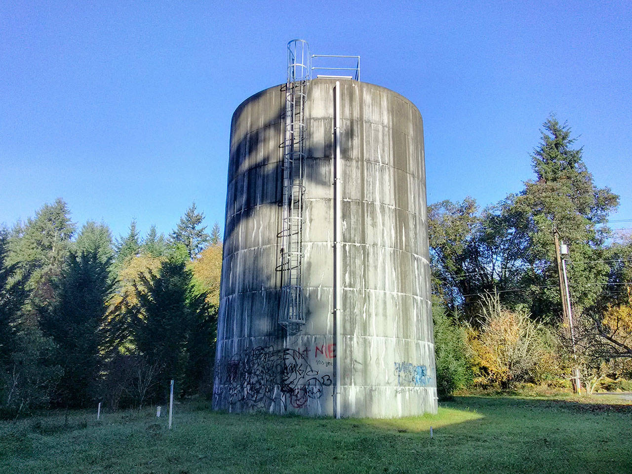The Burton Water Company’s 40-foot tall tank is used for high demand service in the summer months (Paul Rowley/Staff Photo).