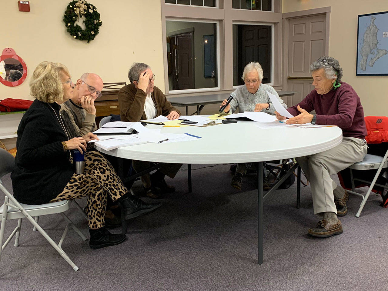 Left to right: LeeAnn Brown, Eric Pryne, Tom Langland, Wendy Noble and Don Wolczko held a Vashon Health Care District Board of Commissioners meeting on Wednesday, Dec. 11 at the Vashon Presbyterian Church (Kevin Opsahl/Staff Photo).