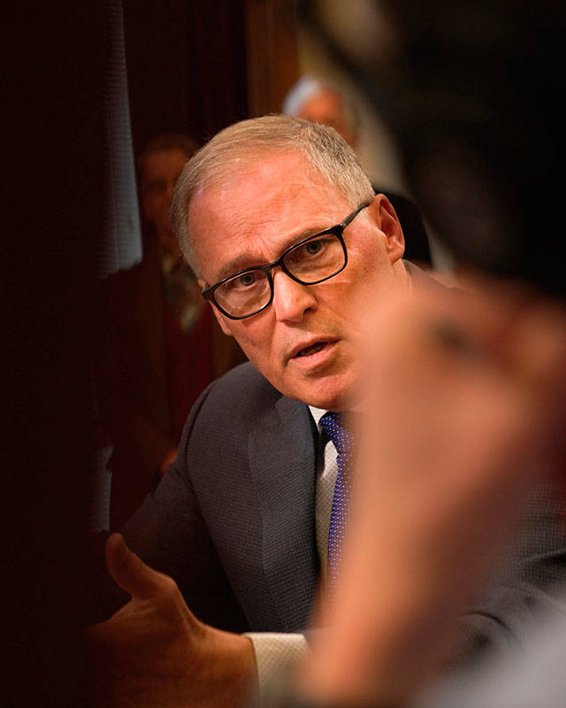 Gov. Jay Inslee answers a reporter’s question during the budget rollout press conference last month (Office of the Governor Photo).