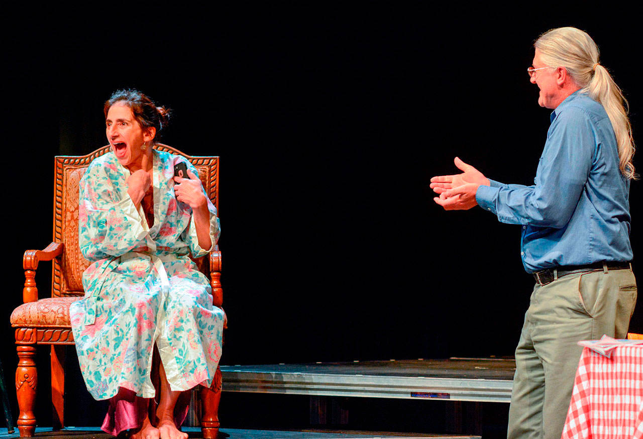 Abby Enson and Steve Jones cut up on stage, in a previous edition of the 14/48 playwriting festival on Vashon (Michelle Bates Photo).