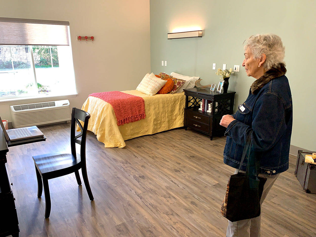 Islander Andree Kolling tours the new memory care wing at Vashon Community Care on Thursday, Feb. 21. (Kevin Opsahl/Staff Photo)