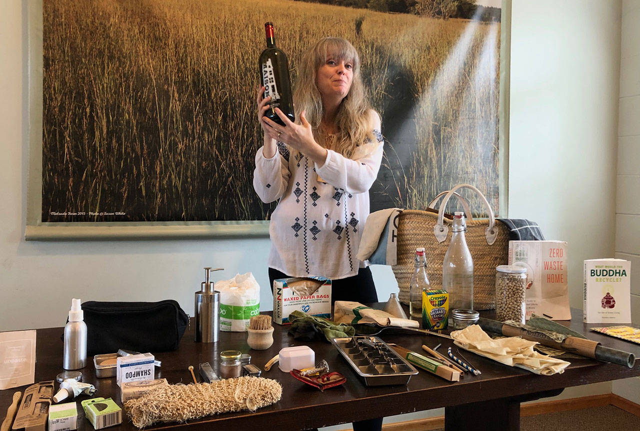 Siobhan McComb shares a tip from her Zero Waste Home, using refillable bottles as an alternative to buying new bottles. (Kate Dowling/Staff Photo)