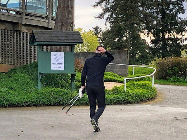 Golf courses in Washington State are deemed nonessential businesses by Gov. Jay Inslee’s “Stay Home, Stay Healthy” order issued on March 23. They are to remain closed at least until May 4, but on Sunday, golfers and others were visible from the roads surrounding Vashon Golf & Swim Club (Tom Hughes Photo).