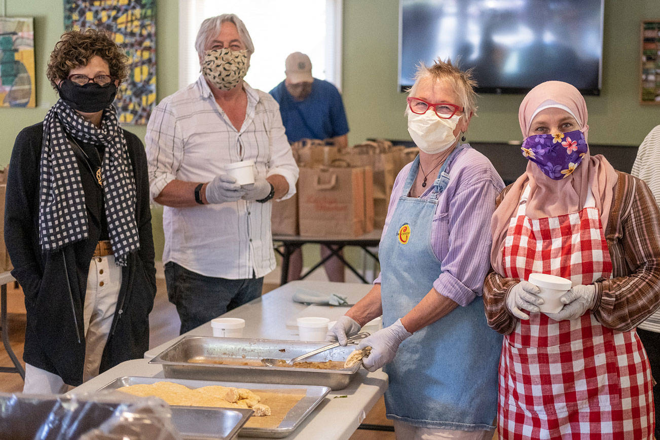 Food being prepared and distributed at the Vashon Senior Center on May 8 (Michelle Bates Photo).