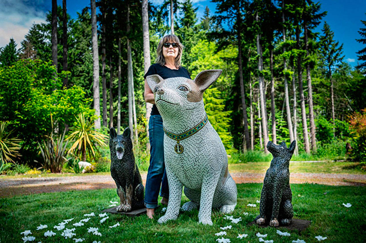 Elaine Summers strikes a pose with some of her creations (Courtesy Photo).