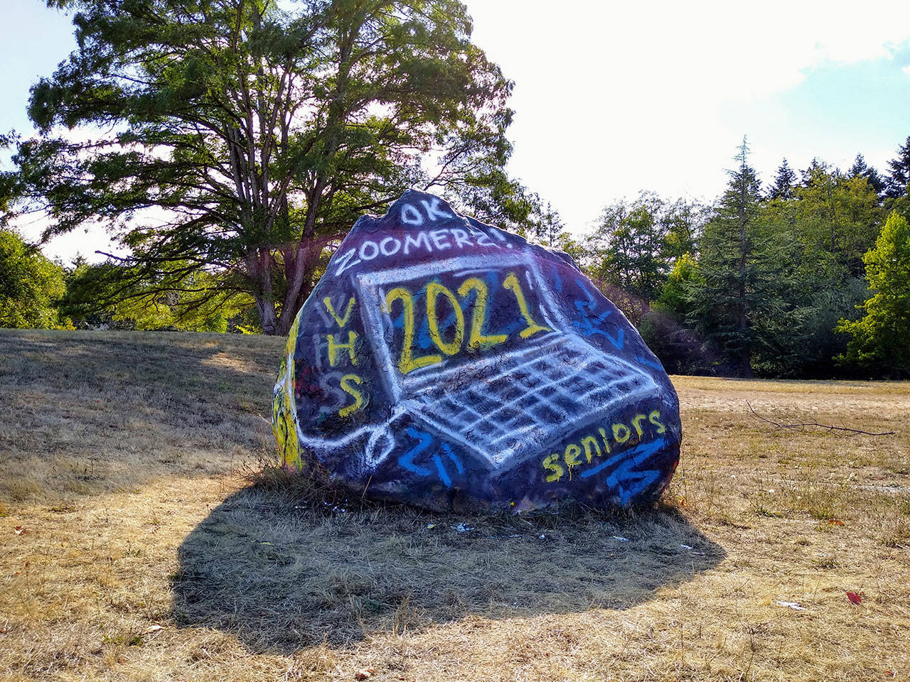 In preparation for the first day of virtual classes at Vashon High School, staff painted the rock on campus to welcome students on material distribution day (Paul Rowley/Staff Photo).