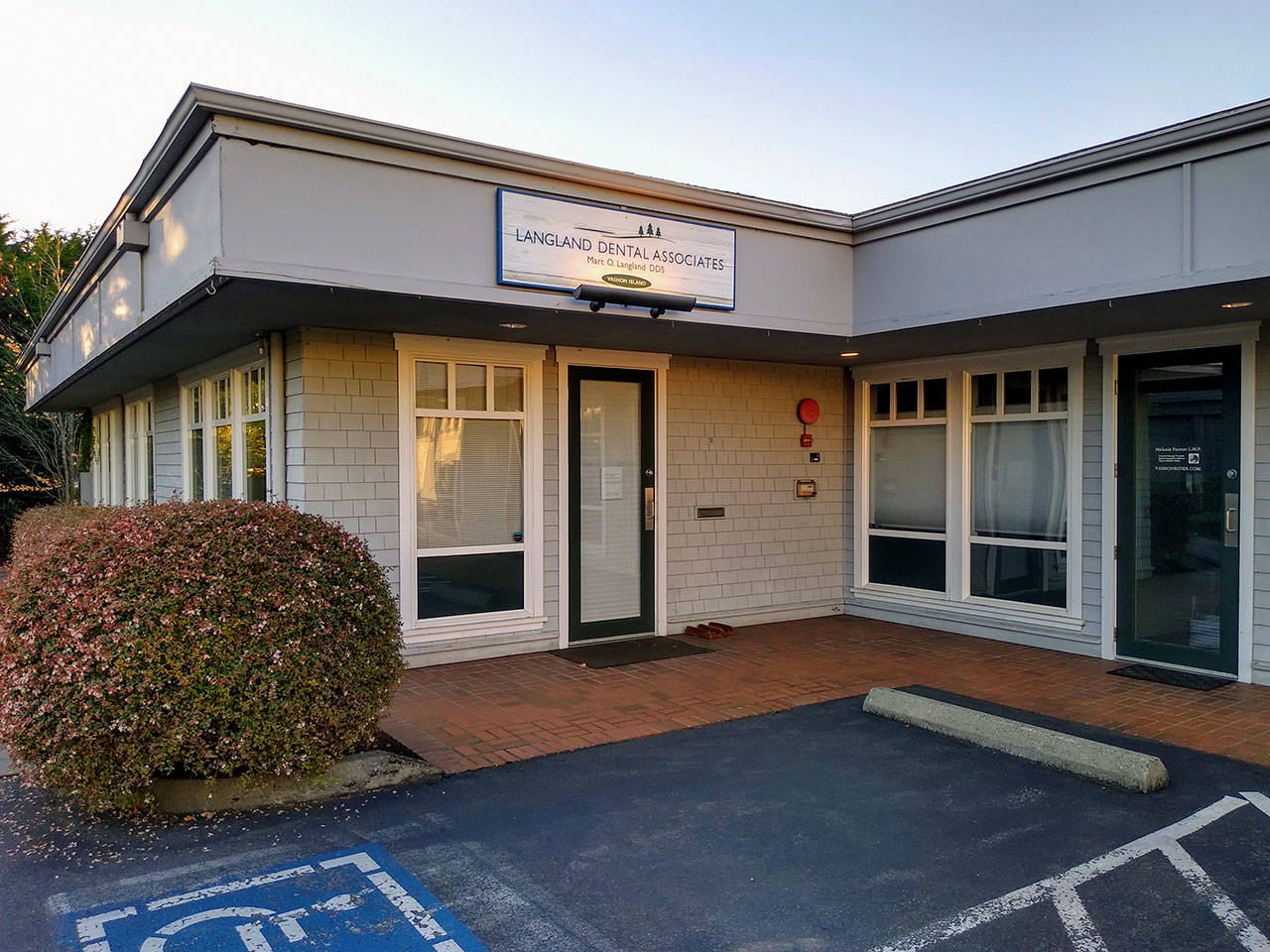 Landland Dental Associates on Monday evening. A sign in the door said the office will be closed the week of Oct. 5 and reopen Oct. 12 (Paul Rowley/Staff Photo).