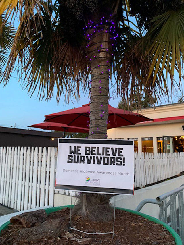A sign promoting The DOVE Project’s second annual “We Believe Survivors” campaign outside Camp Colvos Brewery on Vashon Highway (Courtesy Photo).