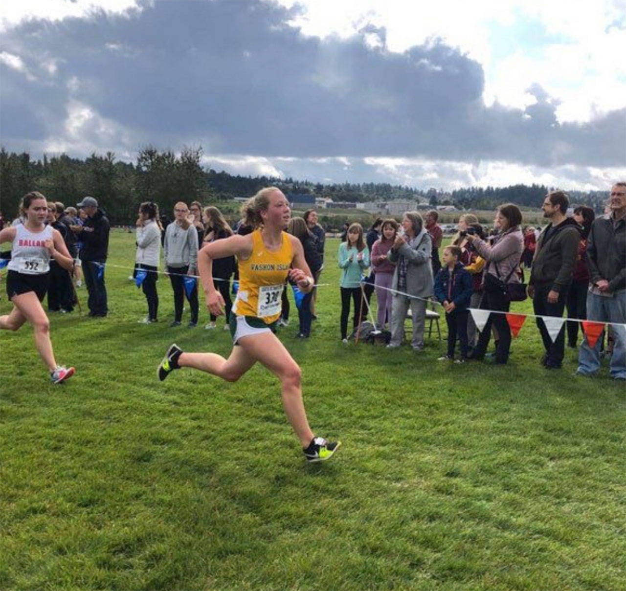 Ella Yarkin has been on the cross country team for three years now, each year holding the best girls 5k record (Photo Courtesy of Ella Yarkin, reprinted from the Vashon Riptide).