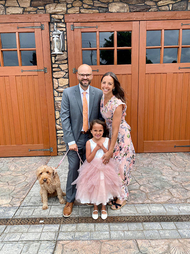 Mark Wagner, with his wife Kalle Marie Wagner, their seven-year-old daughter, Maria Rose and labradoodle Hootie, moved to Vashon in June after Mark received a call to become the pastor of the Vashon United Methodist Church (Courtesy Photo).