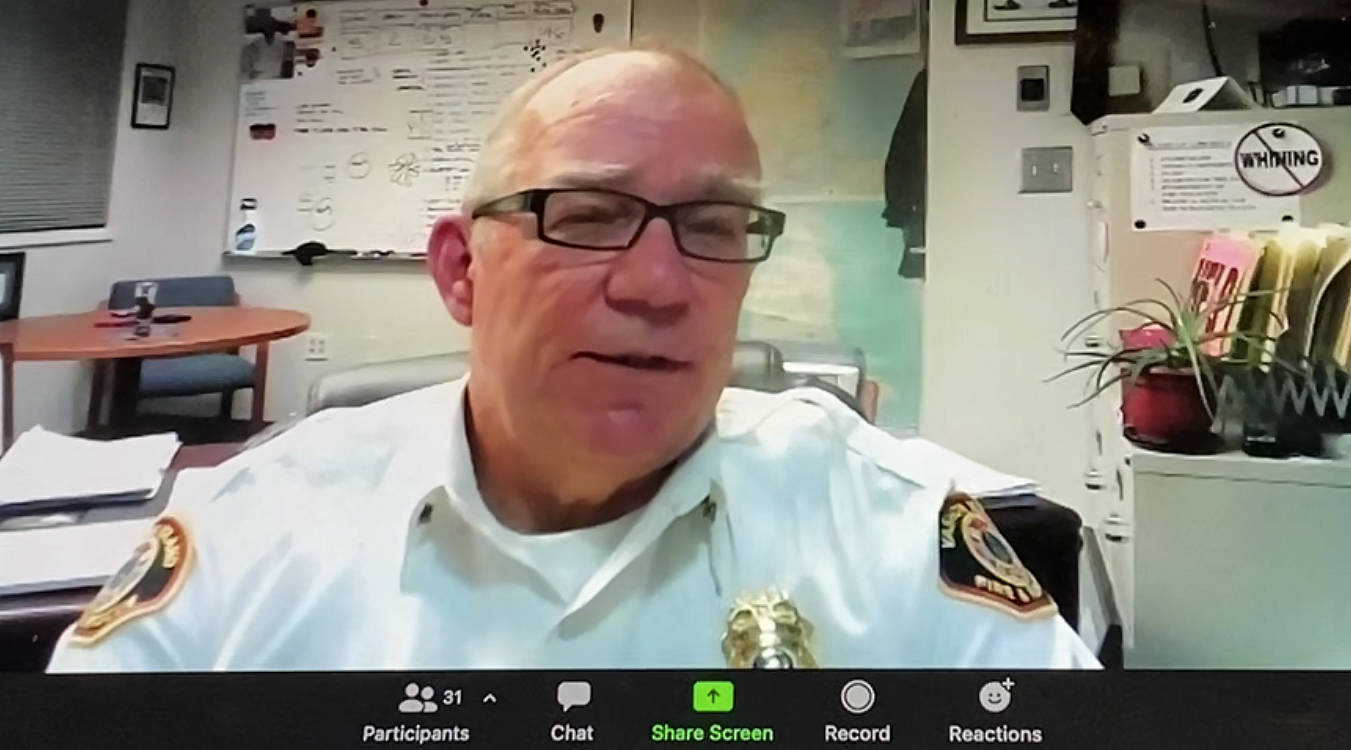 Zoom Screenshot
Fire Chief Charles Krimmert defended his tenure at a fire district meeting on Aug. 26, and said that his opposition to Gov. Jay Inslee’s vaccination mandate for Washington’s health care workers was an example of strong leadership.