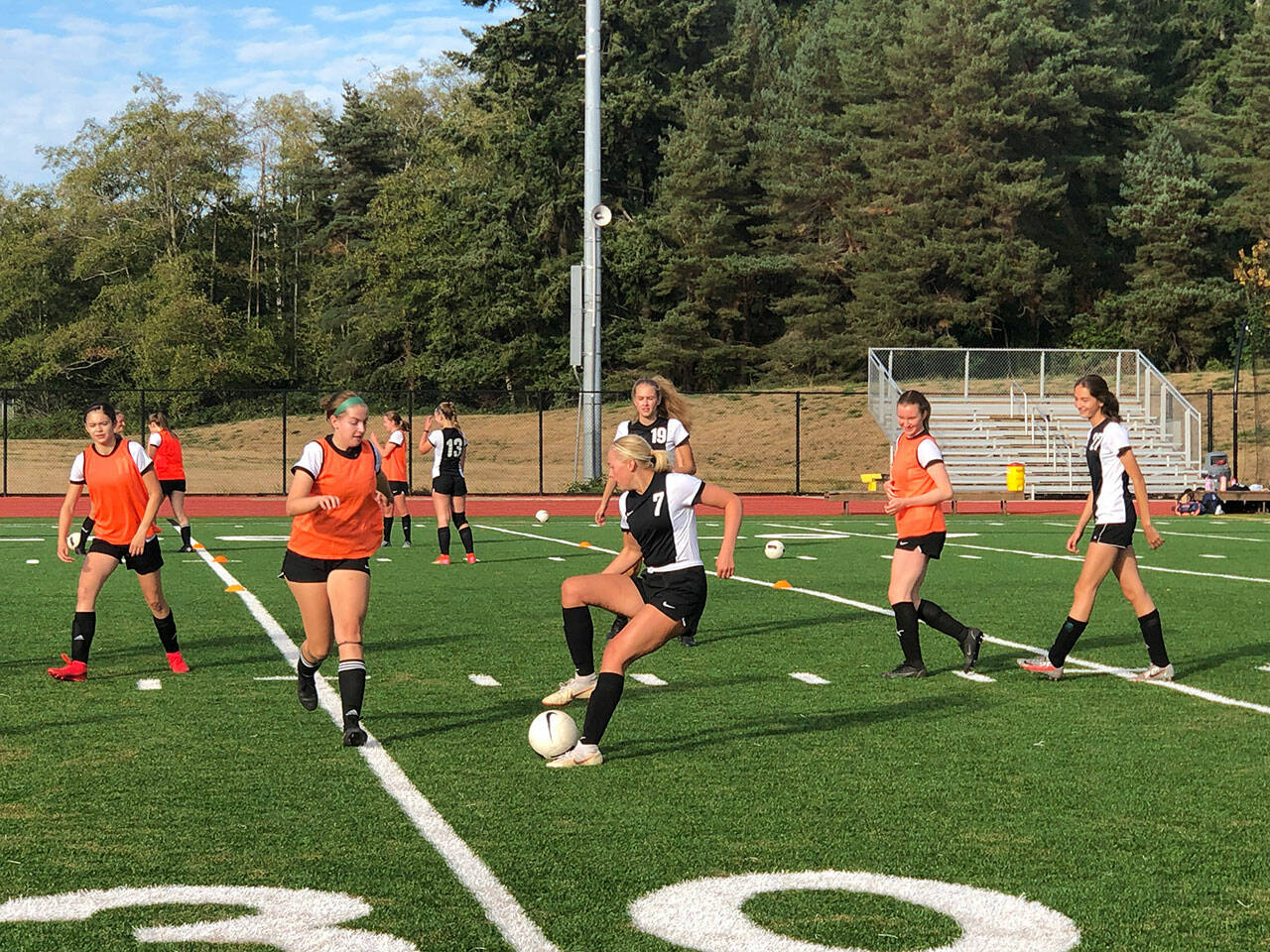 Jenni Wilke Photo
Vashon High School’s girls’ soccer team warmed up for their first home game on Sept. 13, coming off of back-to-back wins in their first two away games.