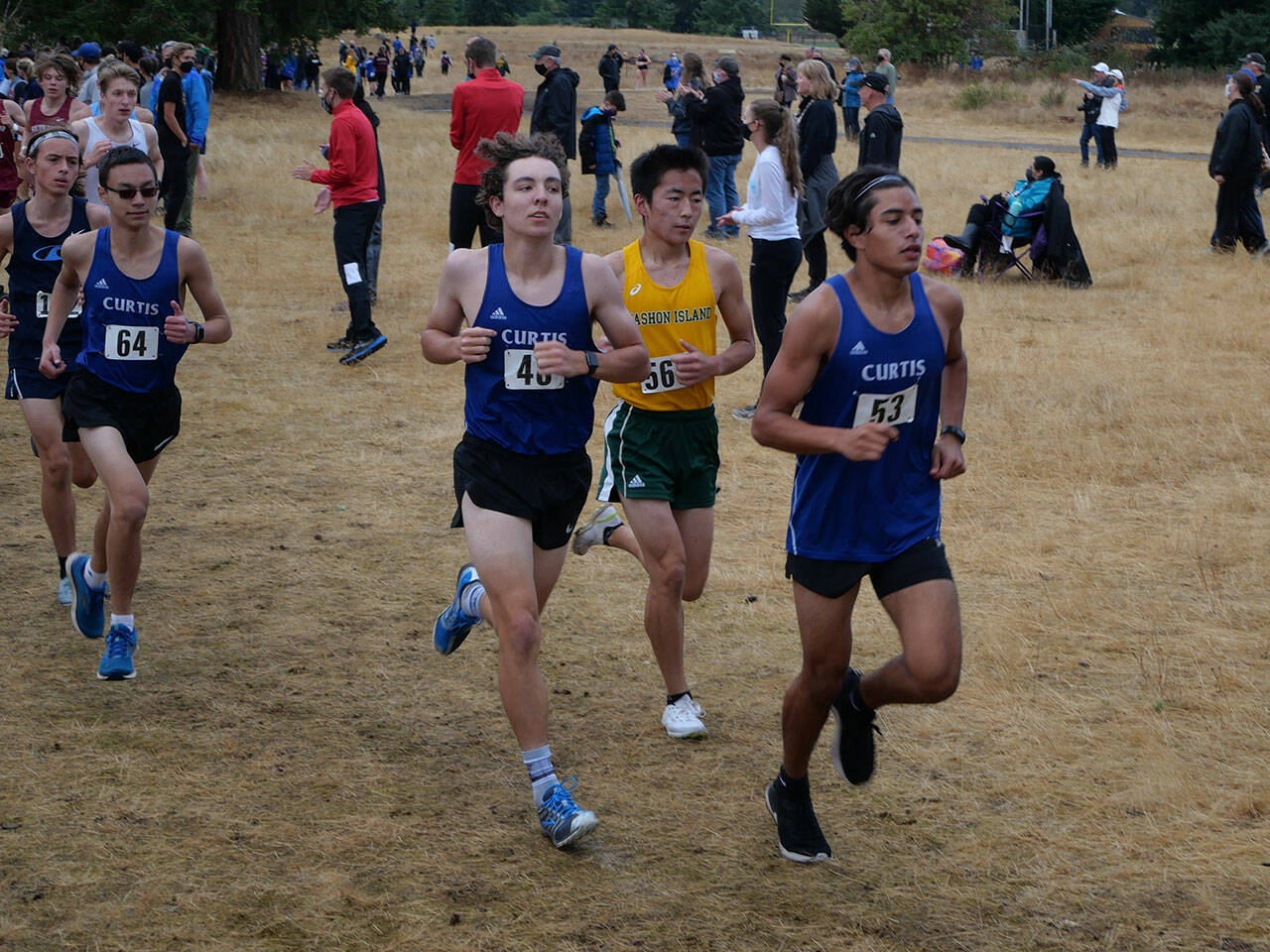 (Bruce Cyra Photo) Cross-country captain Levi Blasingim leads the pack at Pacific Lutheran University, on Sept.18.