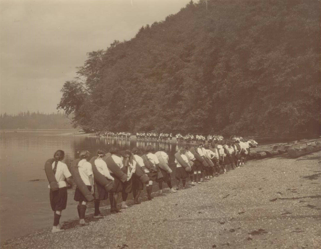 (Photo Courtesy Camp Sealth) Campers from the 1920s heading out on an overnight hike.