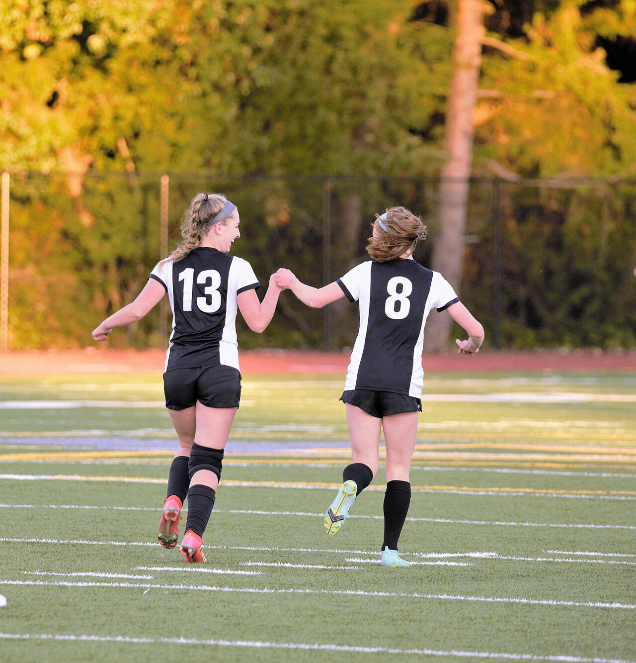 (Kelly Keenan Photo) Mallory Keenan and Olivia Boyes, celebrating one of their goals together.