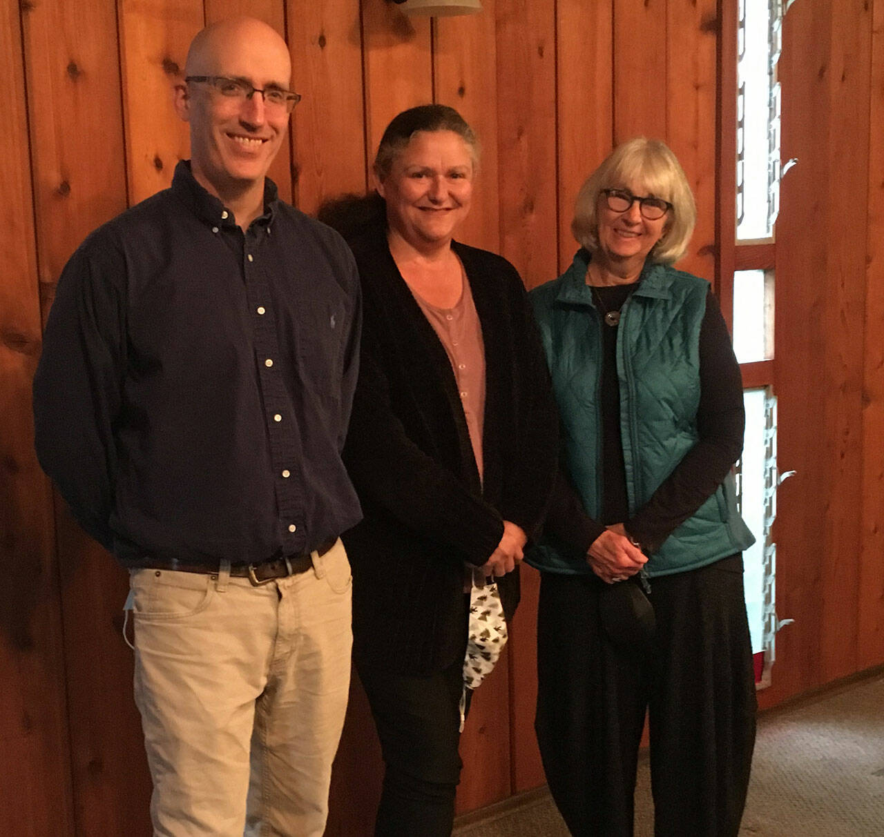 Elizabeth Shepherd Photo
Koshin Christopher Cain, Lisa Devereau and Diane Sweetman are all celebrating Puget Sound Zen Center’s purchase of the Island Funeral Services building and grounds.