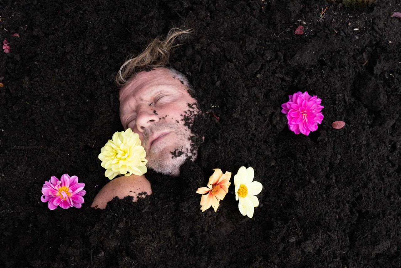 (Shelley Hanna Photo) The Isle of the Dead photo series features dozens of community members  including Adam Cone, seen in this photograph. The exhibition is on display at Snapdragon Bakery & Cafe until the end of November.
