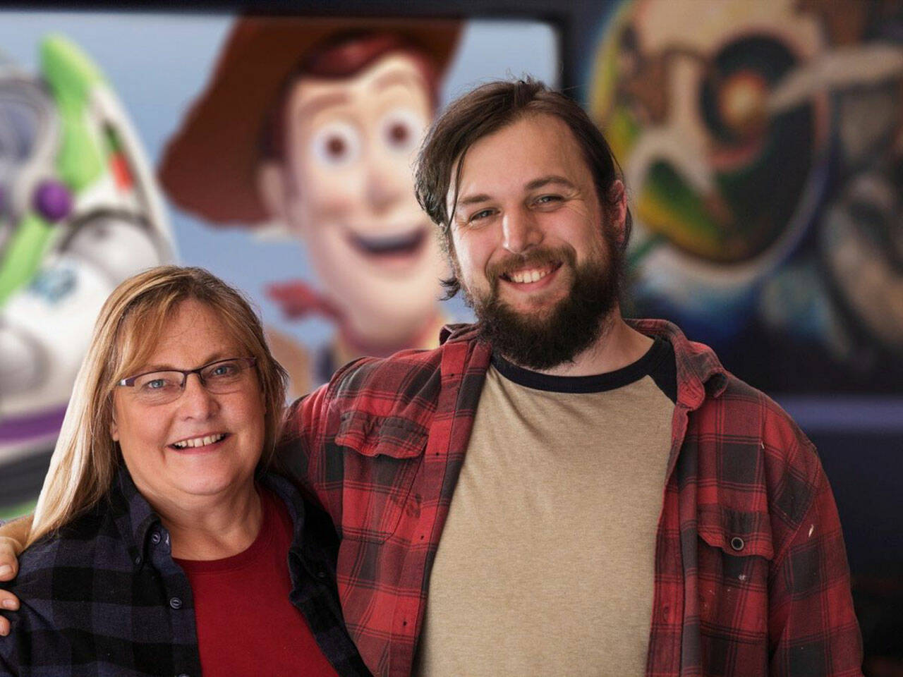 (Todd Pearson Photo) Eileen Wolcott, the matriarch of a single-screen cinema family, with her hardworking son, Jake Wolcott.