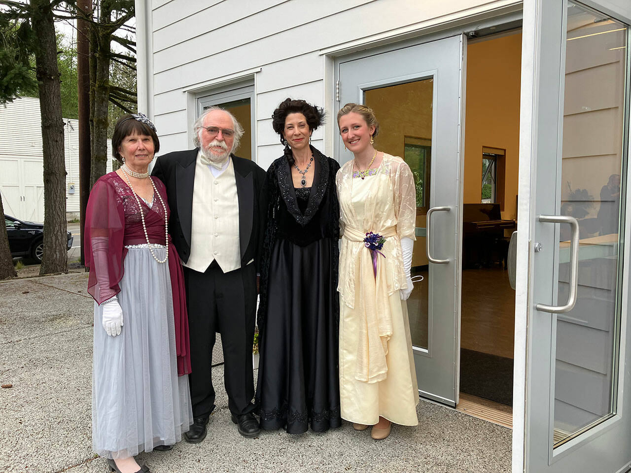 (Elizabeth Shepherd Photo) Vashon Opera singers ‘The Merry Widow’ take in the evening air, outside of Vashon Center for the Arts’ green room, prior to one of the final rehearsals of “The Merry Widow.” Pictured left to right are Carol Butler, George Butler, Jennifer Krikawa and Emily Morse.