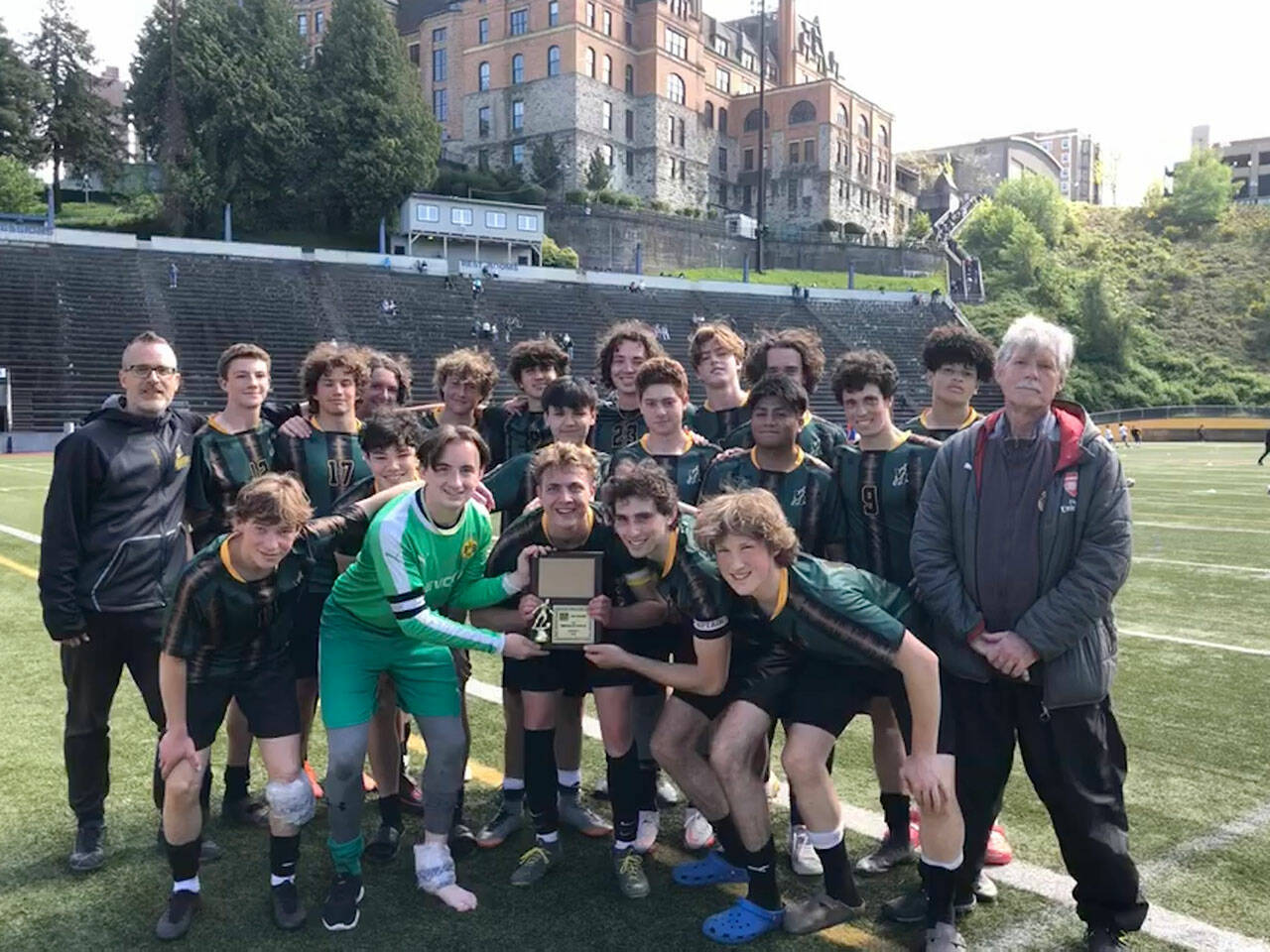 (Photo courtesy Scott Nicolino) The Vashon Pirates pose with the second-place West Central District Champions plaque, after defeating Life Christian in golden goal overtime on Saturday, May 14. The Pirates moved on to the State Championship this week.