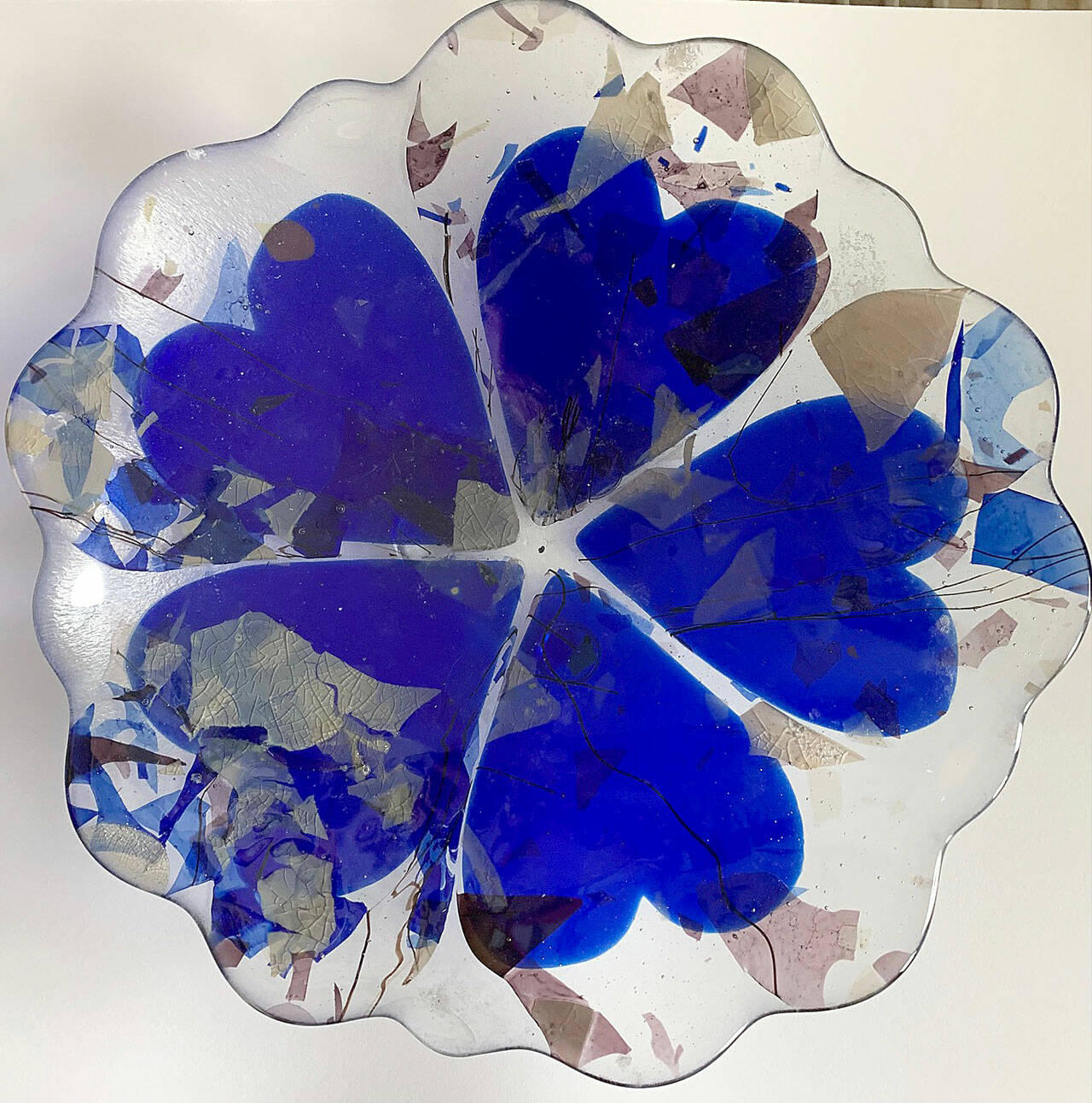 (Gail Hapeman Artwork) “Blue Hearts Bowl,” by VIVA artist Gail Hapeman, is a work of fused glass.