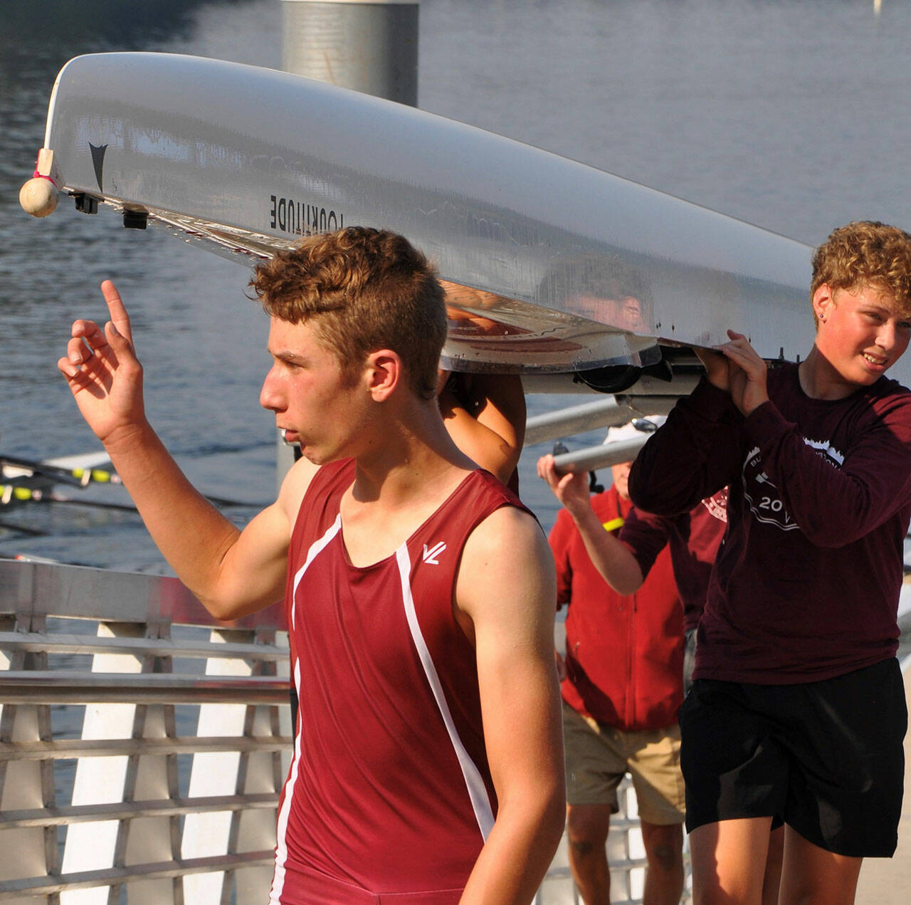 Two of the five members of the Men’s Junior Novice Coxed Quad, Briar Guenther (center) and Emmet Cox (right), after their silver medal performance (Amie Macnab Photo).
