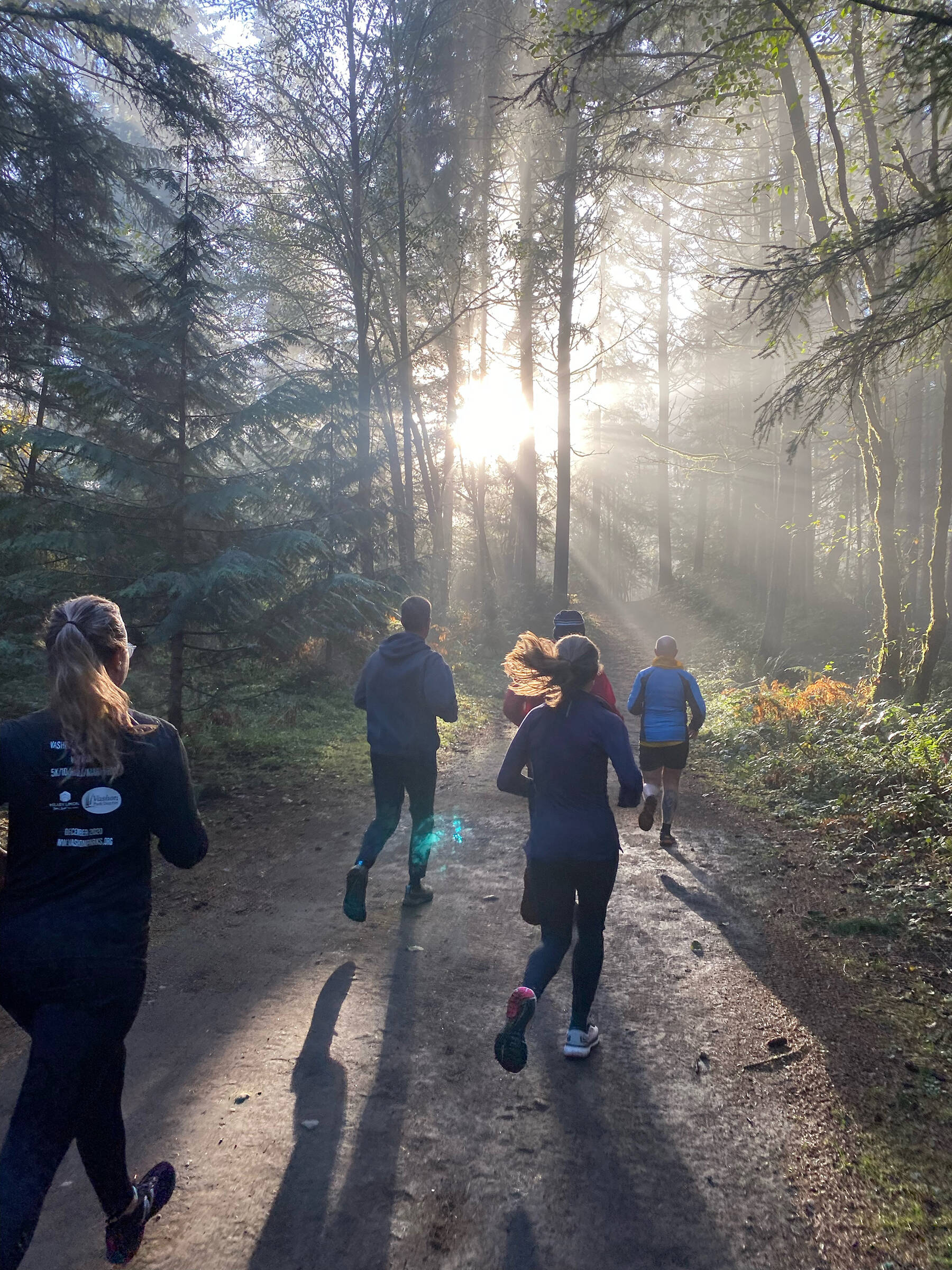 Turkey Trotters made their way through the morning sun and fog on Nov. 24 (Luke Webster Photo).