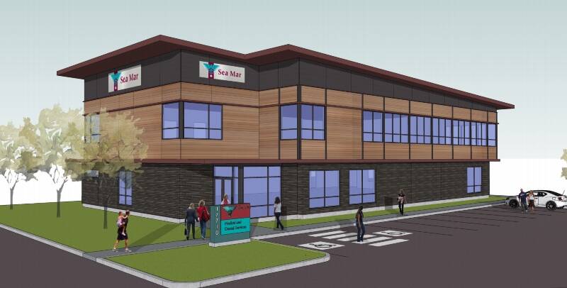 Sea Mars preliminary drawings for a new clinic would site the building on the north side of the current Spinnaker Building property, where that buildings parking lot is now located. The trees shown in the drawing would front 100th Avenue SW, with the building oriented horizontally on the property directly adjacent to the Sugar Shack (Courtesy Graphic).