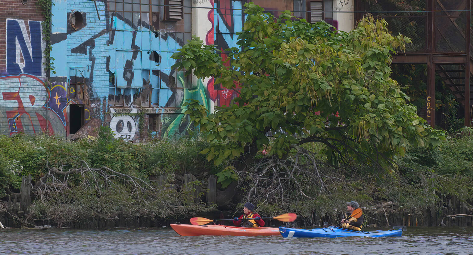 A still from “An American River” shows Mary Bruno and Carl Alderson kayaking down the lower 17 miles of the Passaic River (Scott Morris Productions Photo).