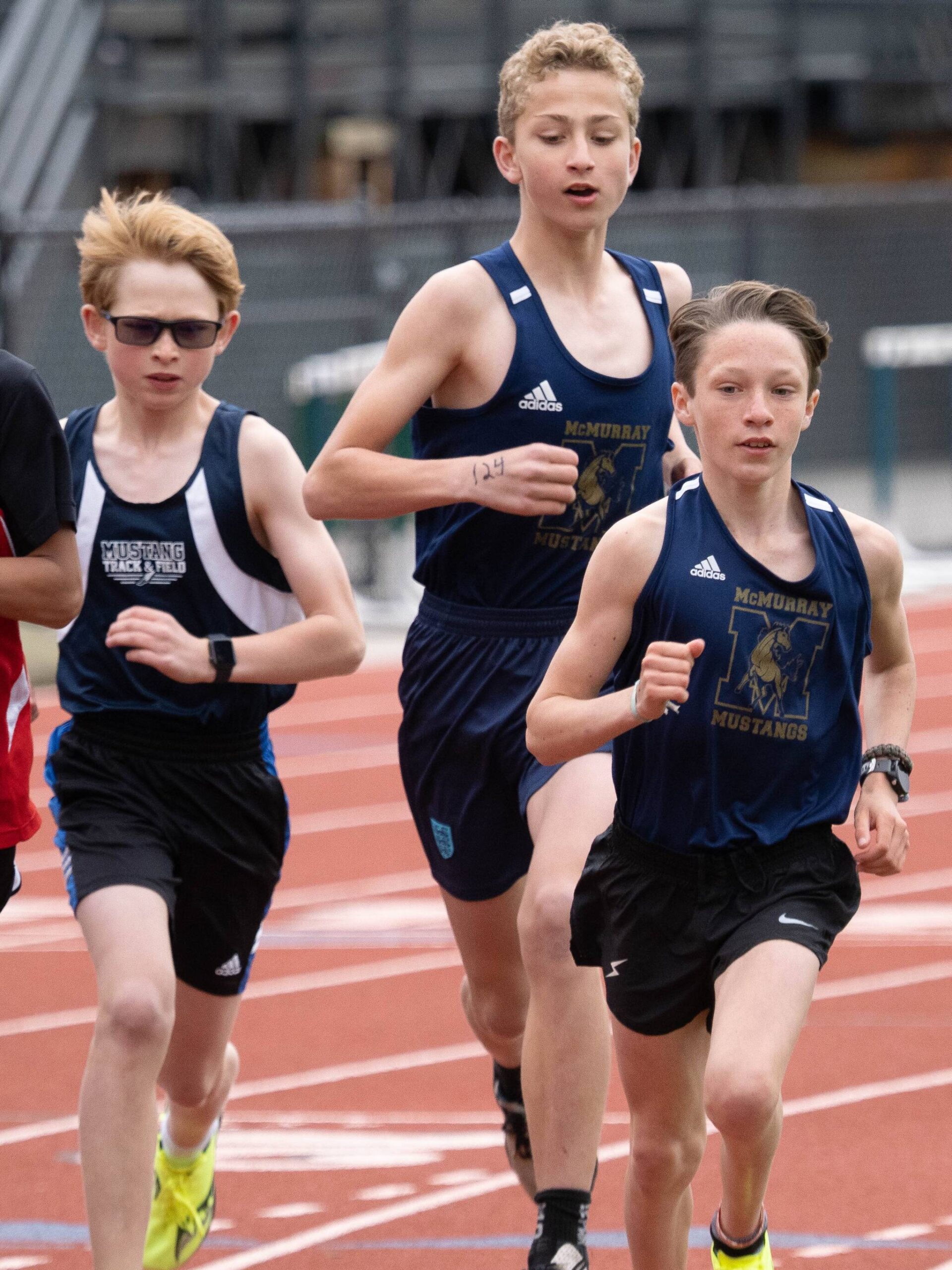 From left to right, Max McLaughlan (third place), Leif McBennett (second place) and Harrison Decker (first place) at the start of the 1600-meter race (John Decker Photo).
