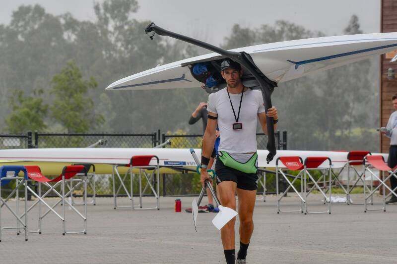 Jacob Plihal carries his single to the water en route to winning the National Selection Regatta in Chula Vista, California (Brett Johnson Photo).
