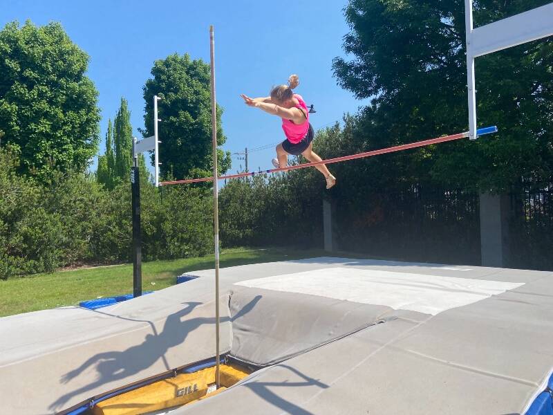 Madeline Yarkin competed in the pole vault event and earned a spot in the Yakima state tournament (Doug VanDevanter Photo).